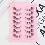 HN08.2 Wholesale 7 Pairs 3D Faux Mink Eyelashes Pack - Natural Long Wispy Lashes - Soft Reusable Clear Band Fake Lashes with Pink Heart Tray